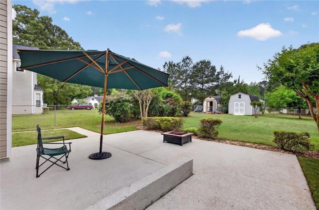 45 Windscape Drive Covington, GA 30016 - Photo 33 of 39 a view of a park with slide
