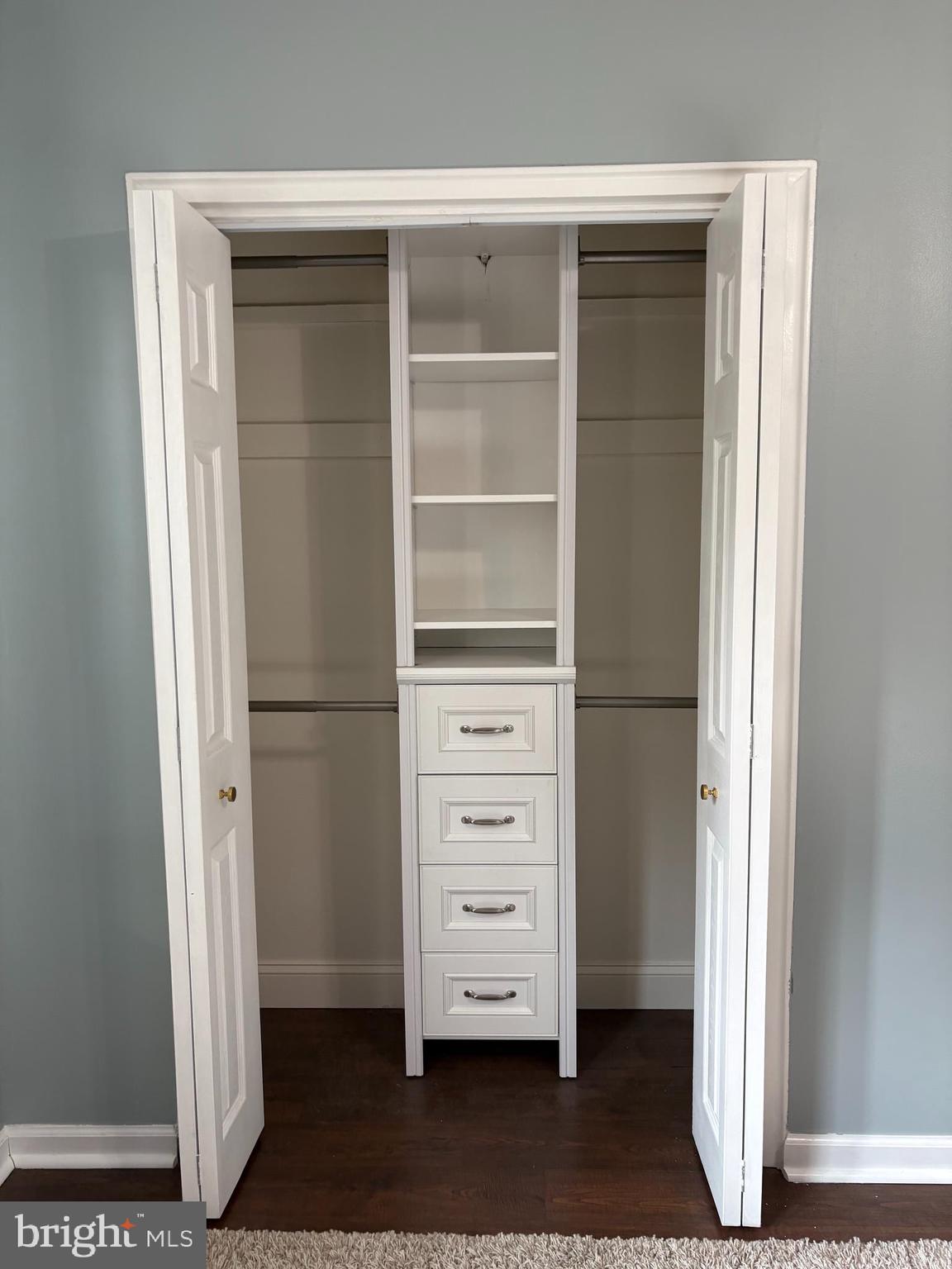 206 North George Mason Drive, Unit 1 Arlington, VA 22203 - Photo 13 of 28 a view of walk in closet with clothes