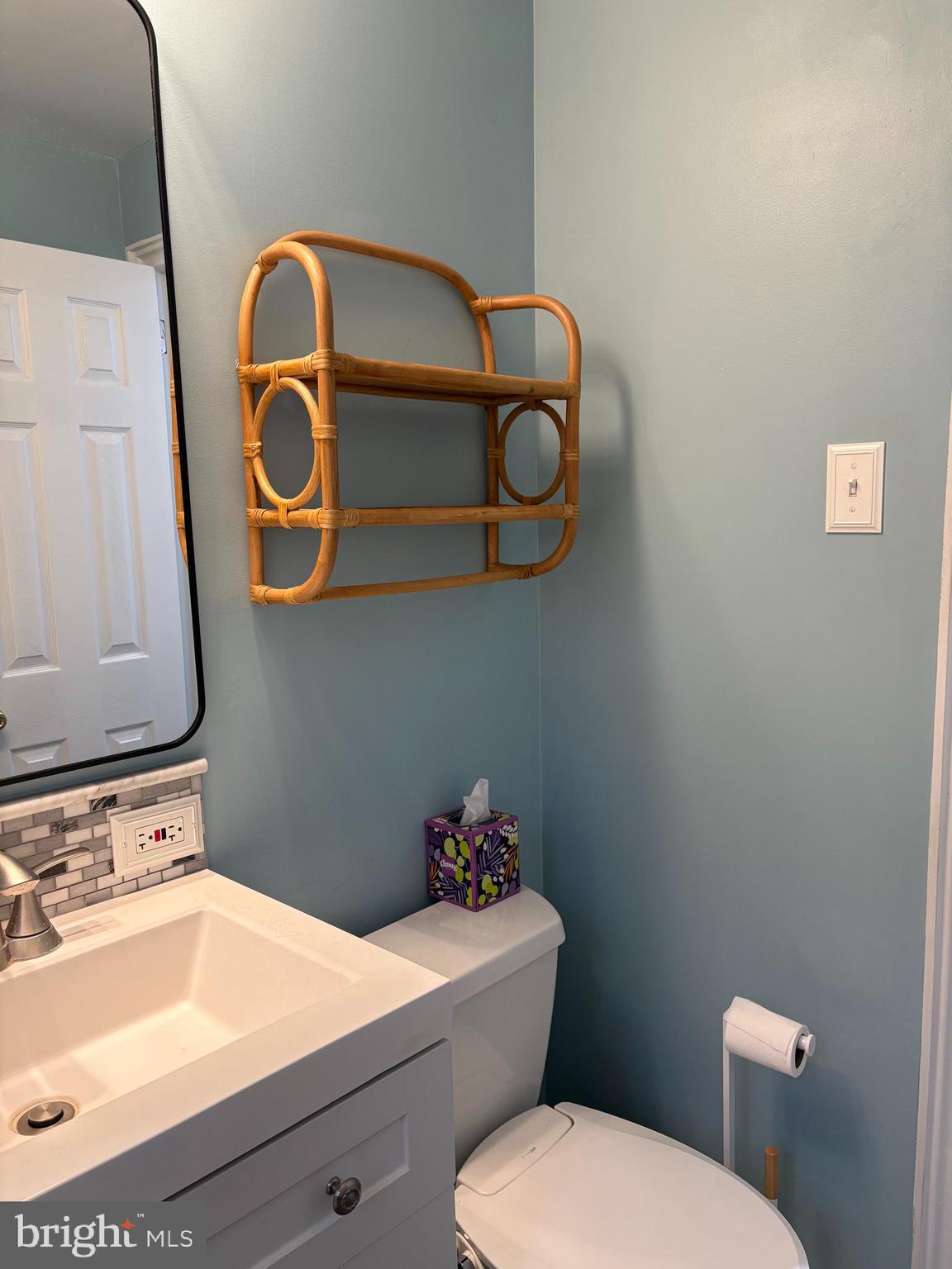 206 North George Mason Drive, Unit 1 Arlington, VA 22203 - Photo 28 of 28 a bathroom with a sink and a mirror