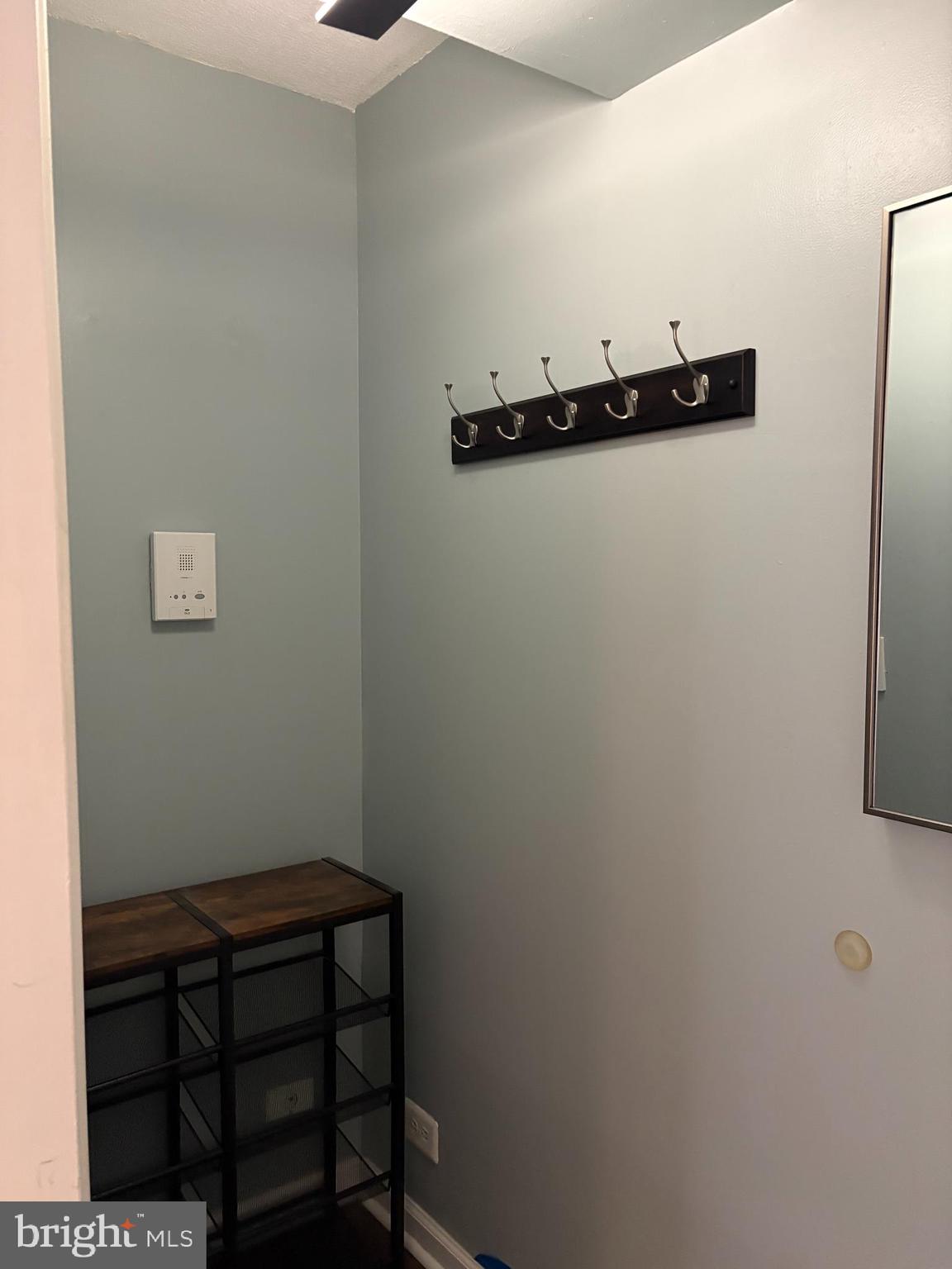 206 North George Mason Drive, Unit 1 Arlington, VA 22203 - Photo 3 of 28 a view of a room with rack on the wall