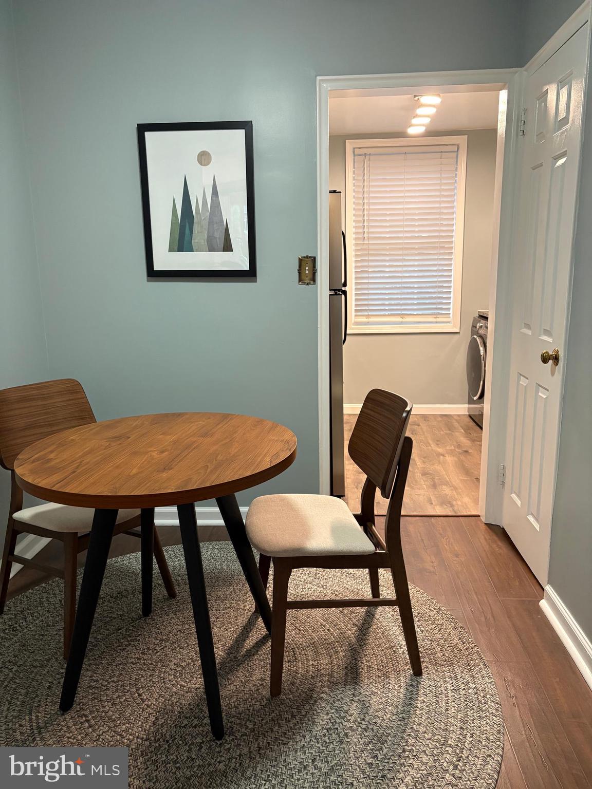 206 North George Mason Drive, Unit 1 Arlington, VA 22203 - Photo 9 of 28 a view of a dining room with furniture