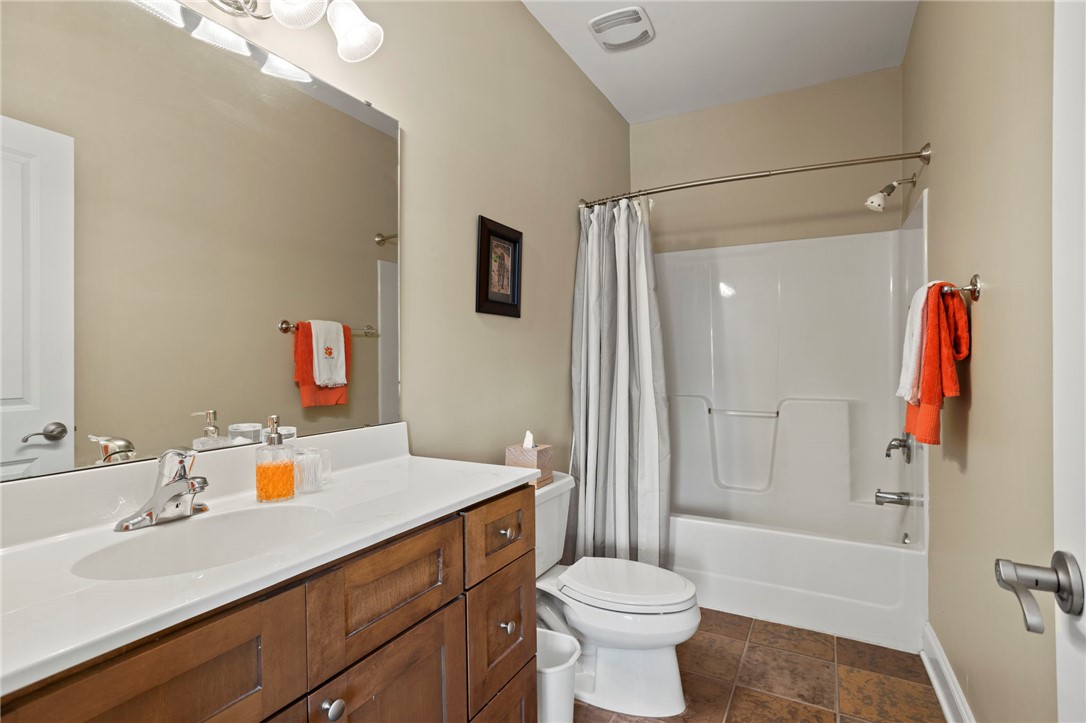 101 Oak Street, Unit 401 Clemson, SC 29631 - Photo 13 of 26 This clean and functional bathroom features a single vanity and a shower-tub combination.