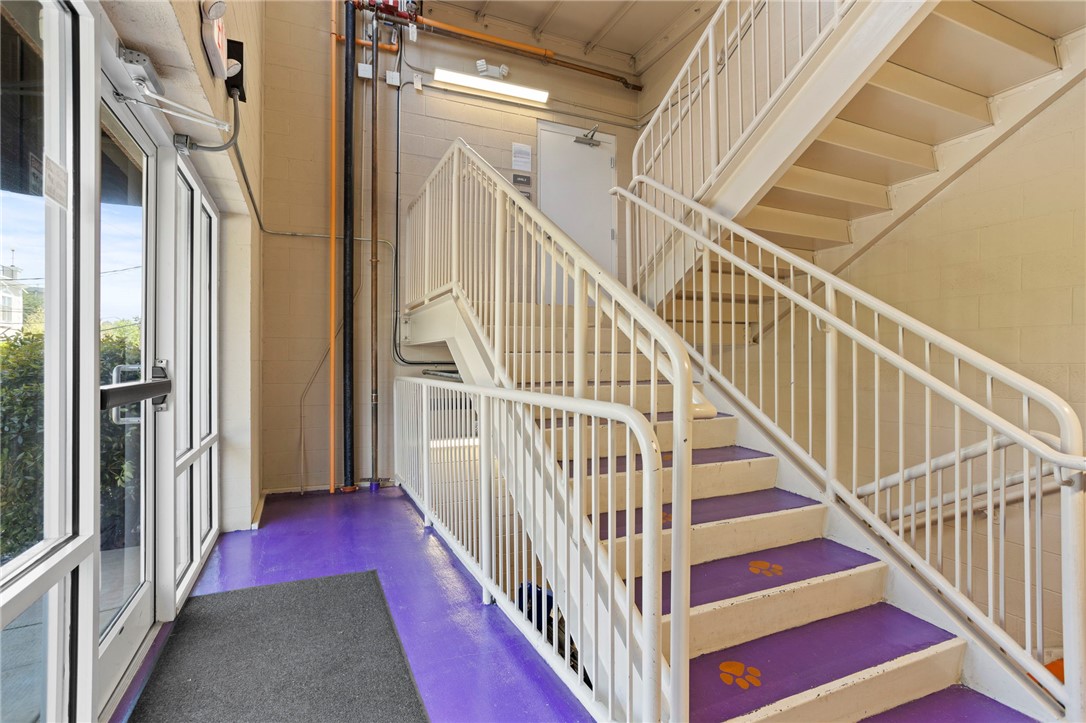 101 Oak Street, Unit 401 Clemson, SC 29631 - Photo 17 of 26 This entry features a multi-level staircase with durable construction and a practical entryway.