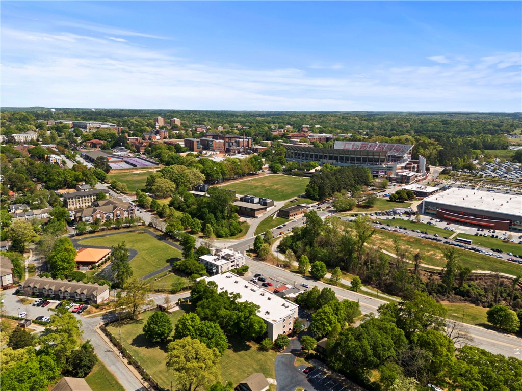 101 Oak Street, Unit 401 Clemson, SC 29631 - Photo 25 of 26 This elevated view captures a vibrant community with expansive green spaces and diverse architectural styles.