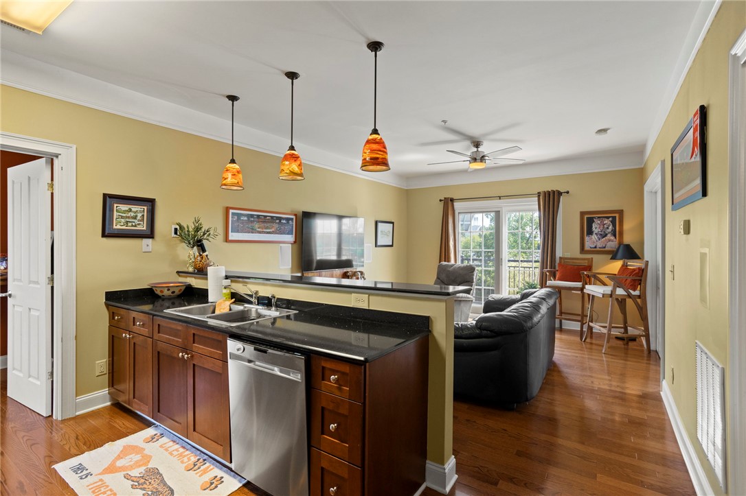 101 Oak Street, Unit 401 Clemson, SC 29631 - Photo 5 of 26 An inviting open-concept living area with a functional kitchen and a comfortable living space.