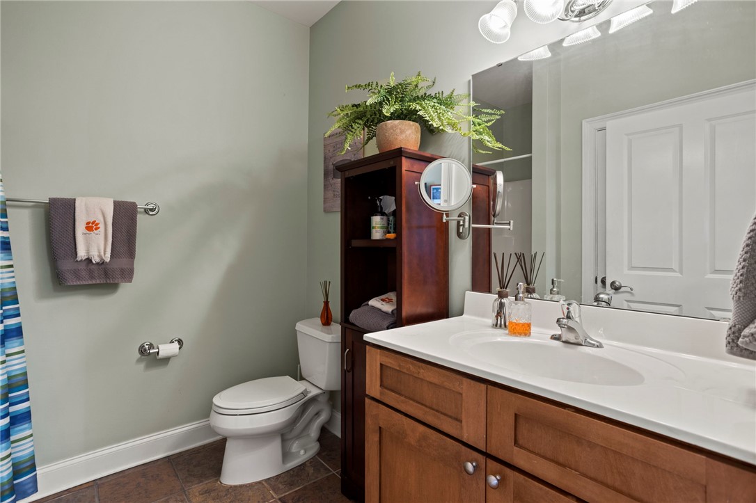 101 Oak Street, Unit 401 Clemson, SC 29631 - Photo 7 of 26 This bright bathroom features a spacious vanity with ample storage.