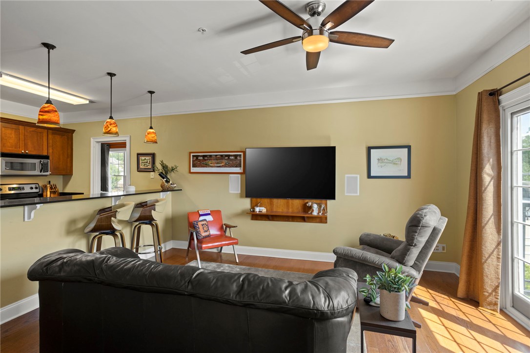 101 Oak Street, Unit 401 Clemson, SC 29631 - Photo 10 of 26 This inviting space features an open layout connecting the kitchen and living areas, perfect for daily living.