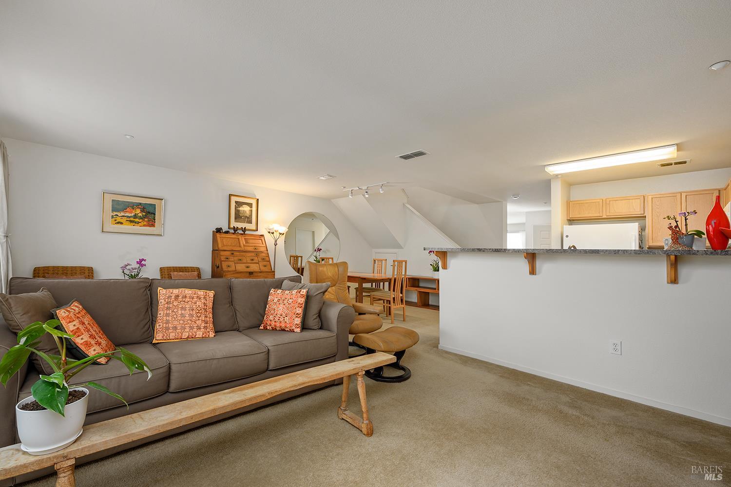 84 Crissy Place Novato, CA 94949 - Photo 19 of 37 a living room with furniture and a wooden floor