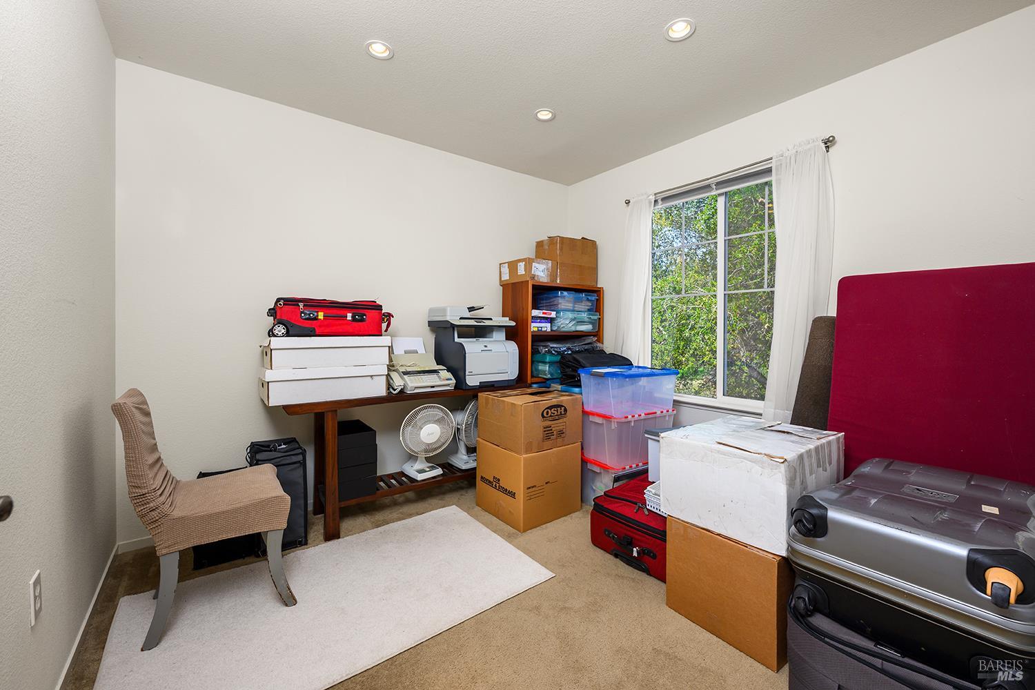 84 Crissy Place Novato, CA 94949 - Photo 26 of 37 a living room with furniture and a flat screen tv