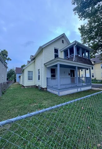 a view of a back yard of the house