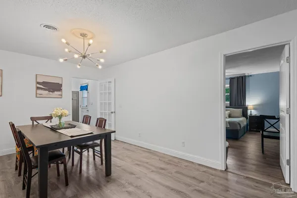 a view of a dining room with furniture