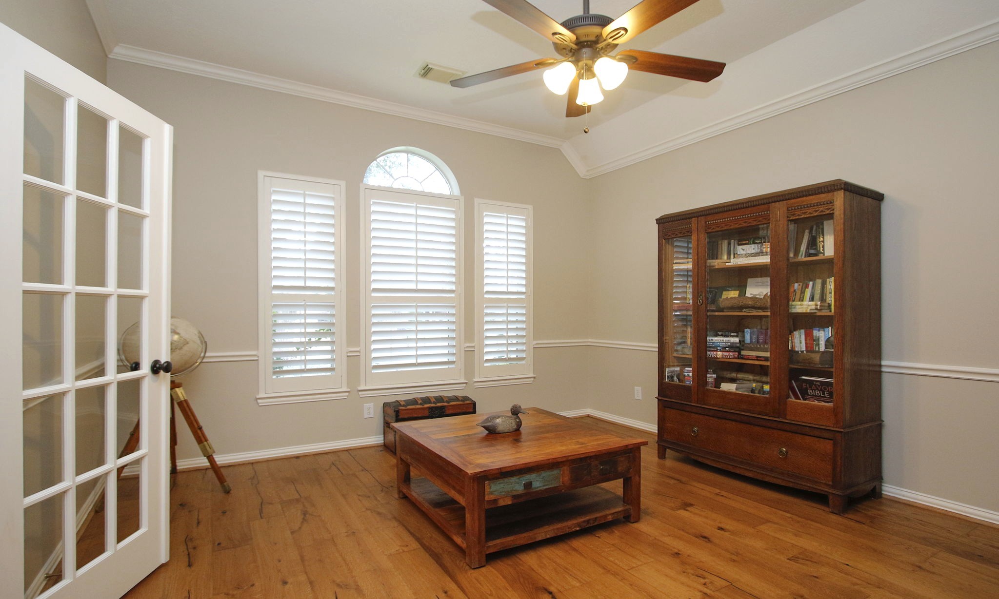 20110 Stormy Pine Lane Spring, TX 77379 - Photo 9 of 44 A dedicated home office accented by plantation shutters, hardwood floors and French doors creates an ideal work-from-home lifestyle!