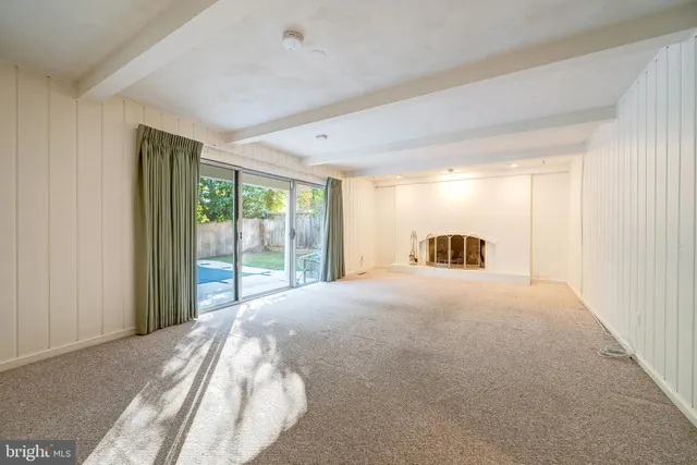 a bathroom with a sink a light fixture and a mirror