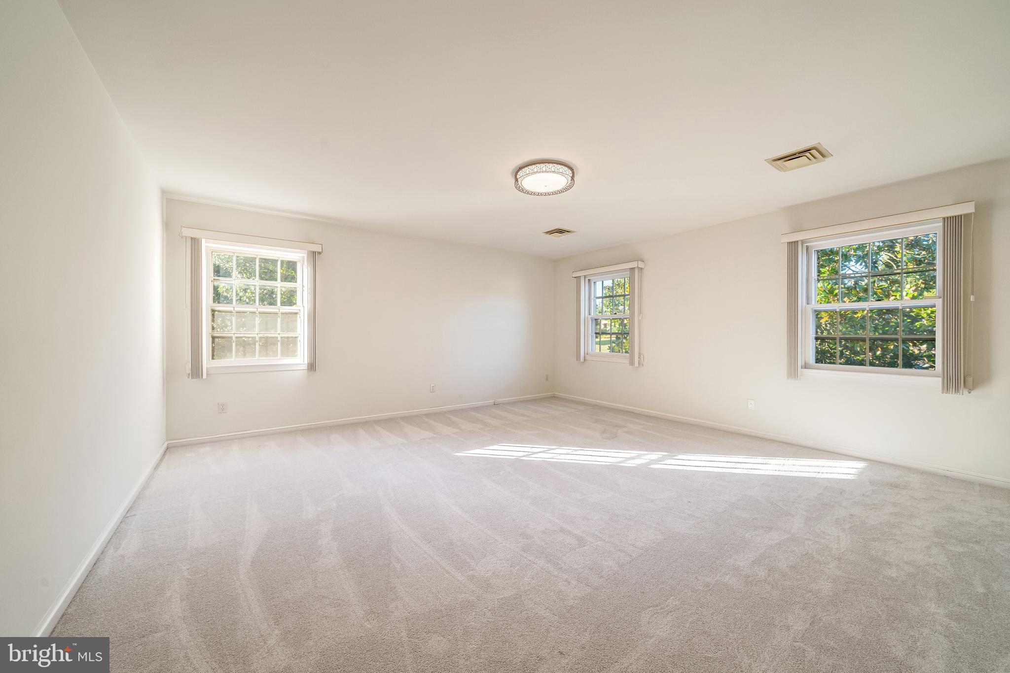 6209 Stoneham Lane McLean, VA 22101 - Photo 34 of 49 an empty room with windows
