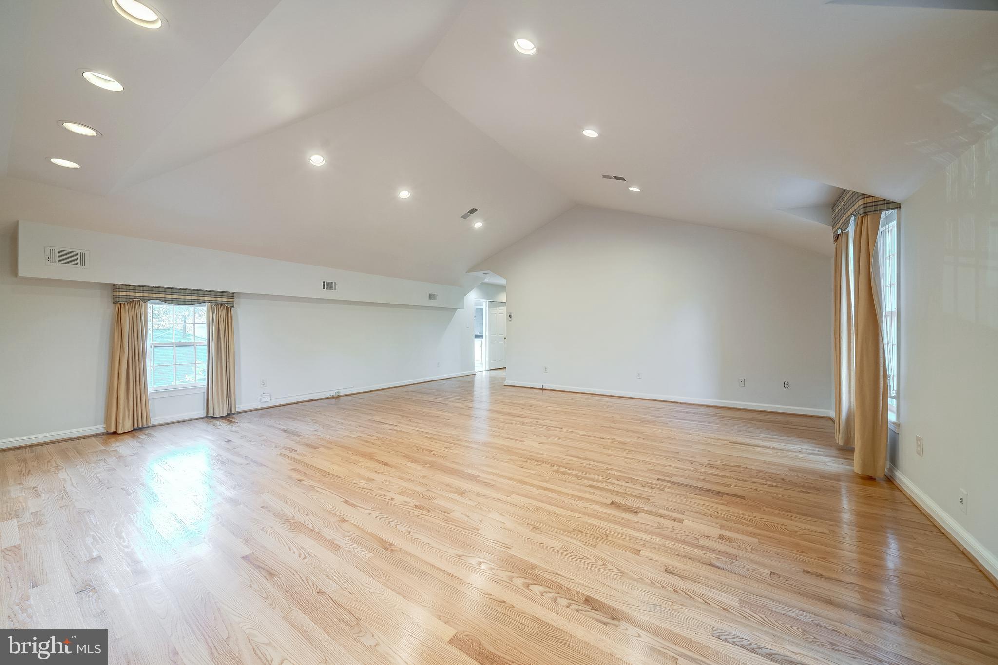 6209 Stoneham Lane McLean, VA 22101 - Photo 41 of 49 a view of empty room with wooden floor