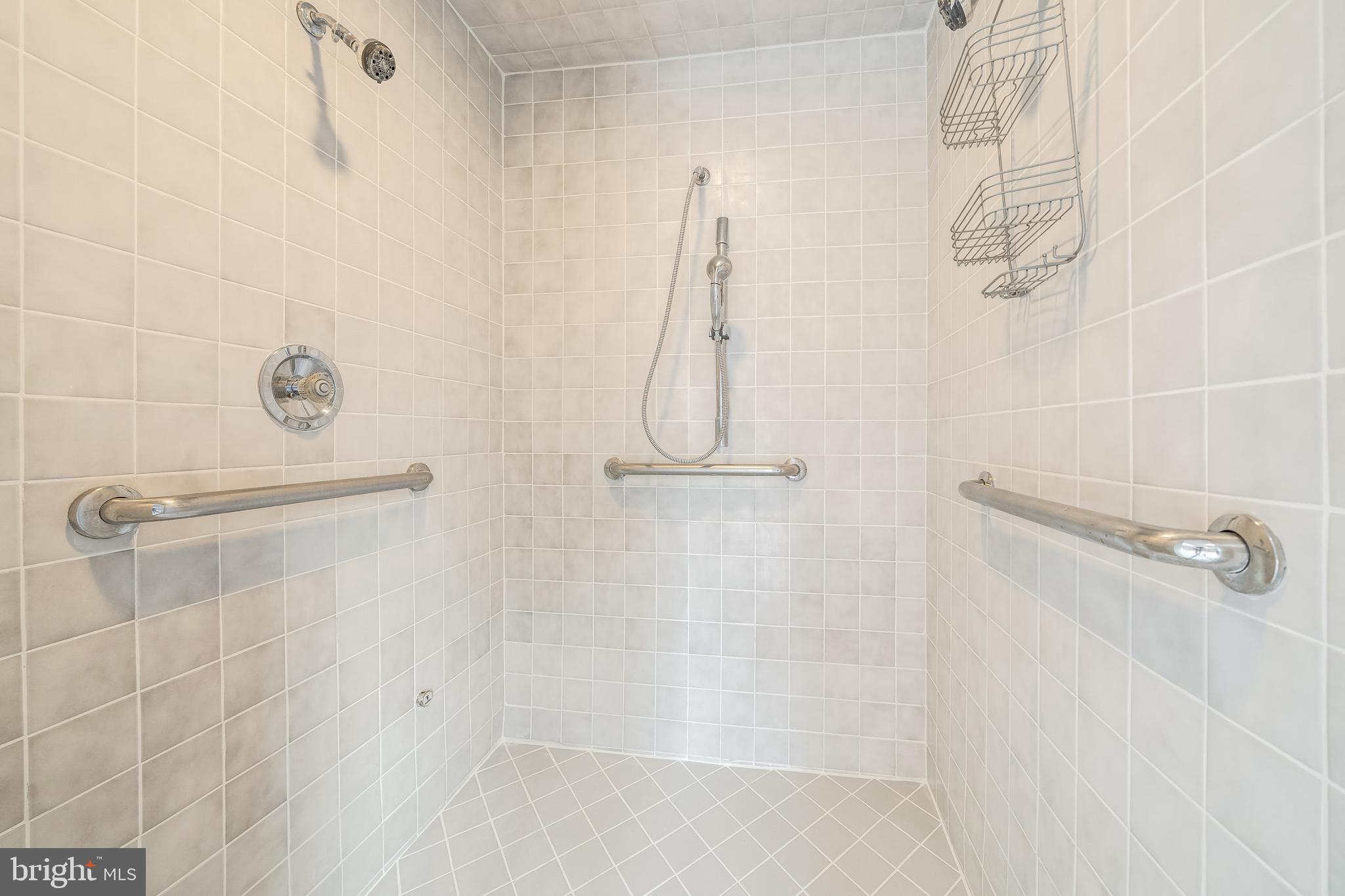 6209 Stoneham Lane McLean, VA 22101 - Photo 45 of 49 a bathroom with a shower