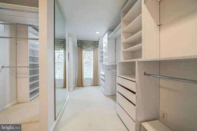 a view of balcony with wooden floor and fence