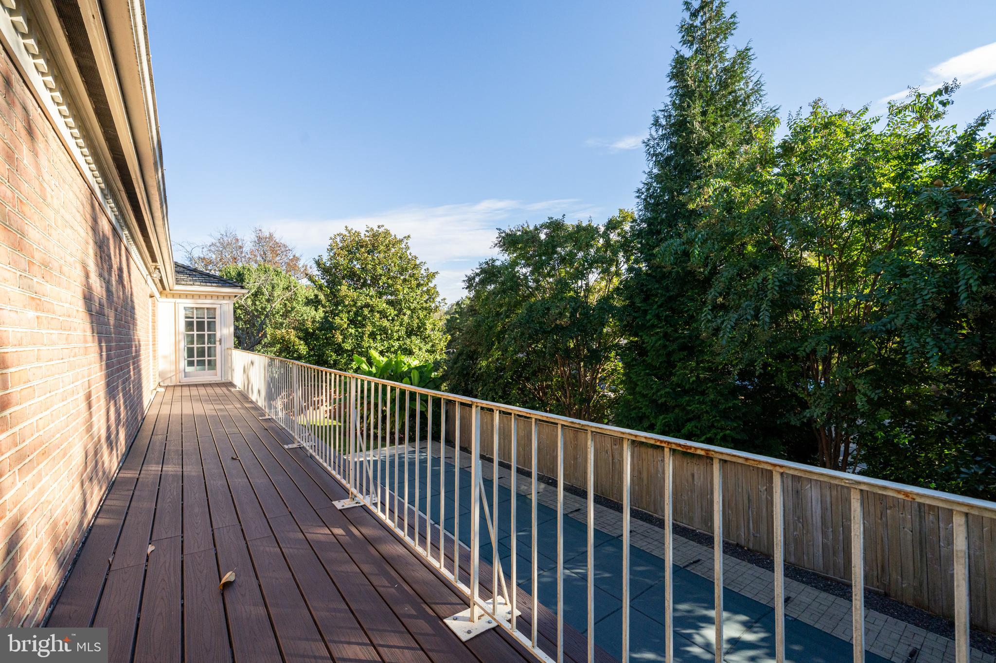 6209 Stoneham Lane McLean, VA 22101 - Photo 49 of 49 a view of balcony with wooden floor and fence