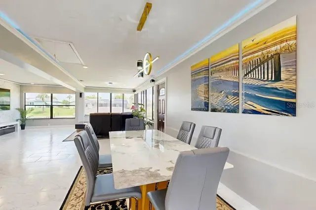 a view of a dining room with furniture