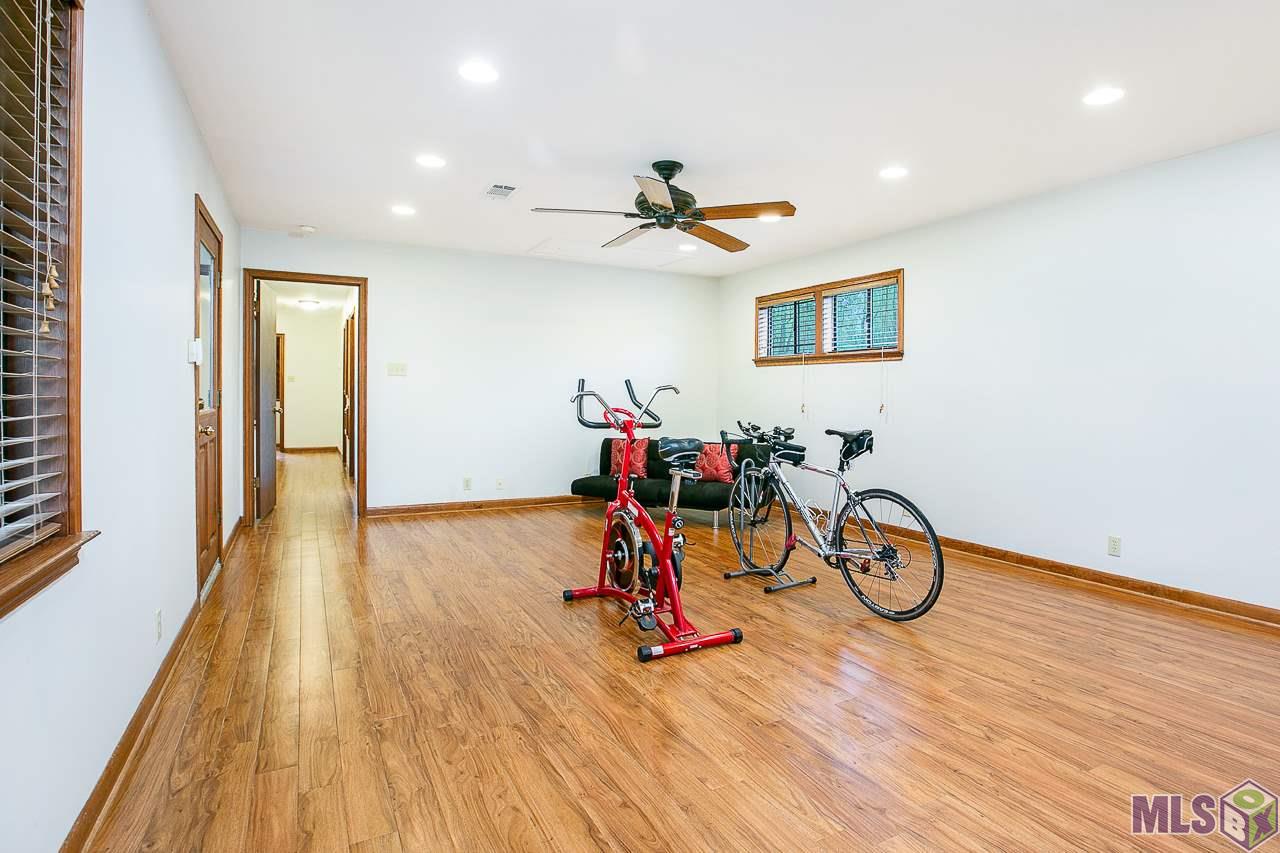 17715 Creek Hollow Road Baton Rouge, LA 70817 - Photo 22 of 37 GAMEROOM/BONUS ROOM/ MEDIA ROOM