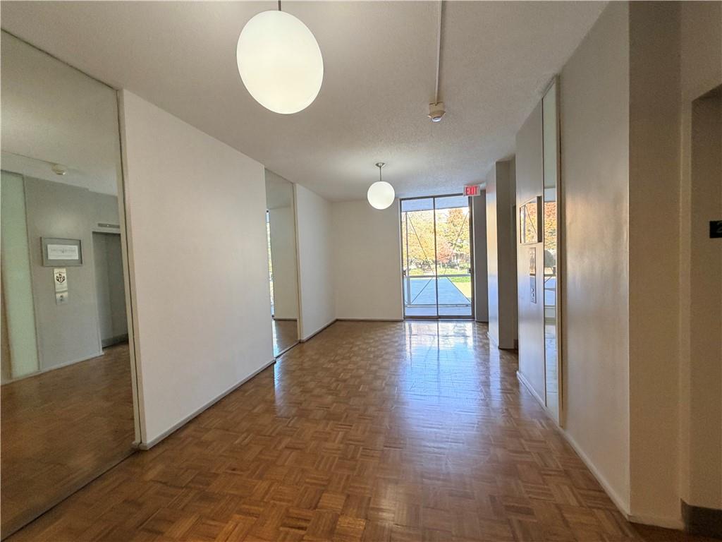 130 Twenty 6th Street, Unit 214 Atlanta, GA 30344 - Photo 25 of 42 a view of hallway with wooden floor