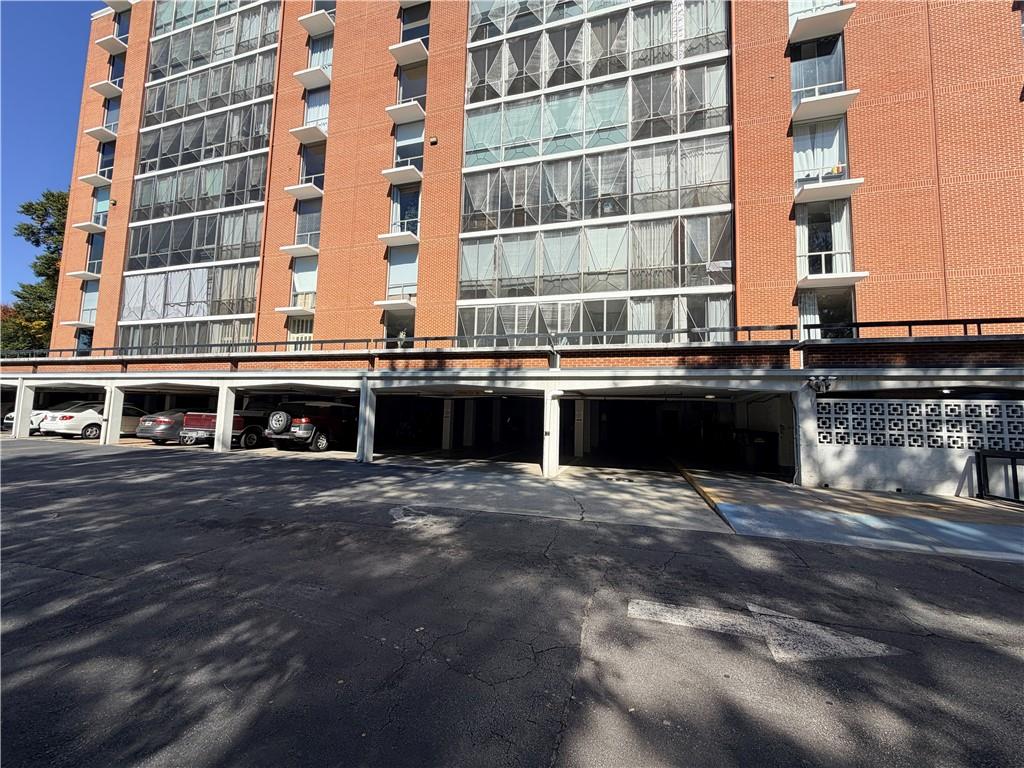 130 Twenty 6th Street, Unit 214 Atlanta, GA 30344 - Photo 30 of 42 a large building with a sink and a yard