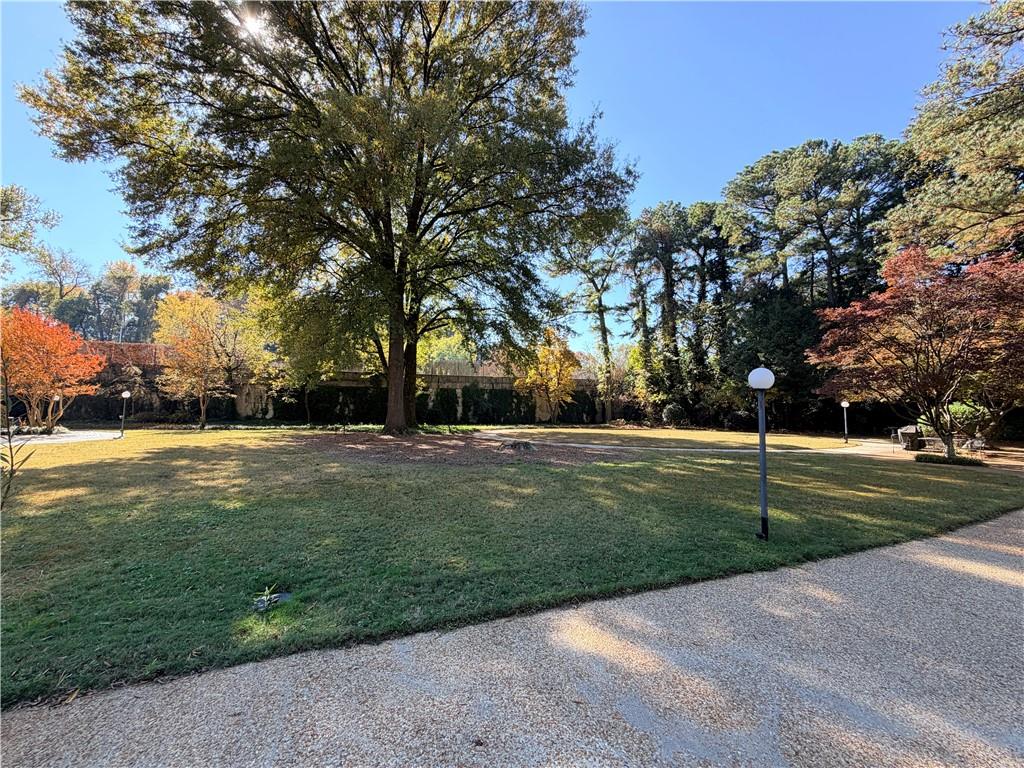 130 Twenty 6th Street, Unit 214 Atlanta, GA 30344 - Photo 32 of 42 a view of road with trees