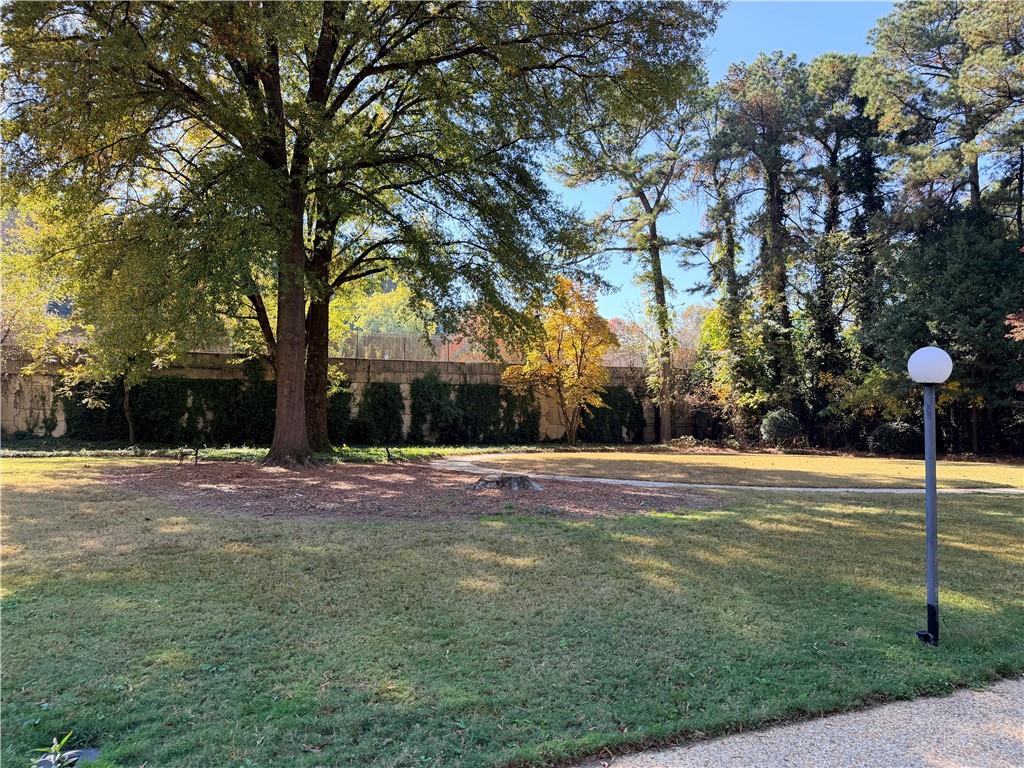 130 Twenty 6th Street, Unit 214 Atlanta, GA 30344 - Photo 35 of 42 a view of a yard and basketball court