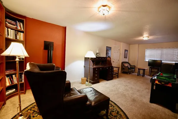 a view of a livingroom with furniture and a couch