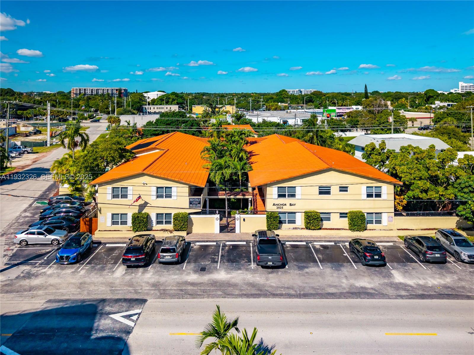 2025 Miami Road, Unit 19 Fort Lauderdale, FL 33316 - Photo 1 of 30 a view of multiple houses with a swimming pool
