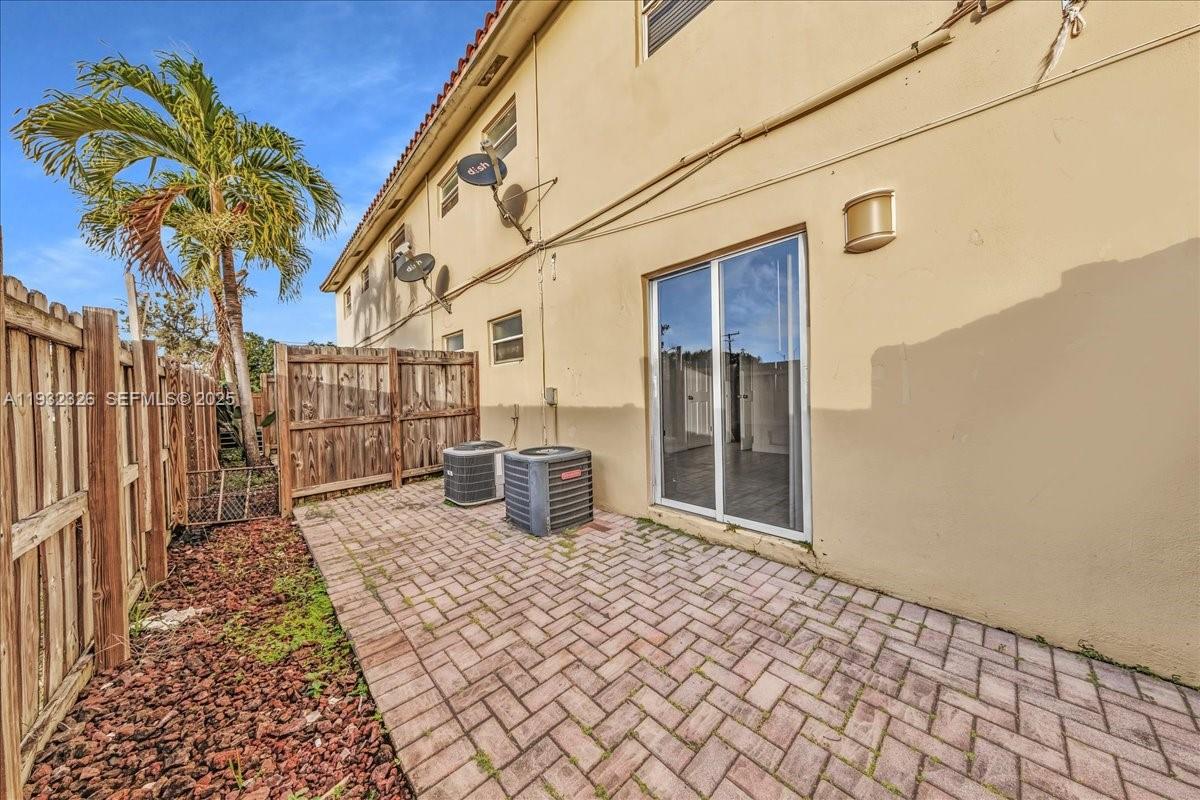 2025 Miami Road, Unit 19 Fort Lauderdale, FL 33316 - Photo 24 of 30 a view of a house with a patio