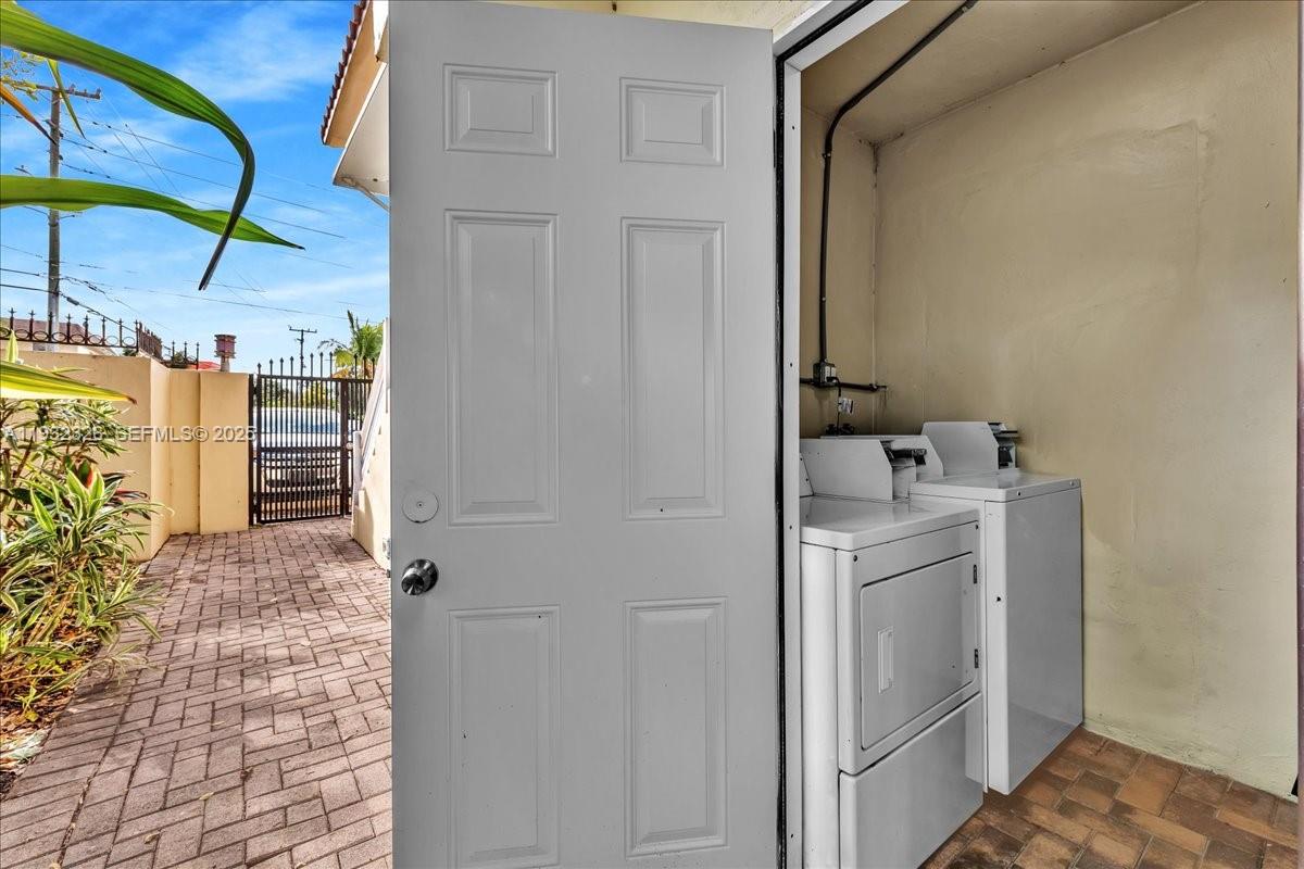 2025 Miami Road, Unit 19 Fort Lauderdale, FL 33316 - Photo 27 of 30 a utility room with dryer and washer