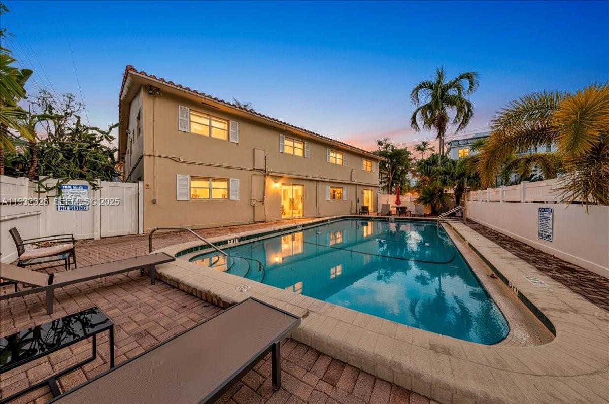2025 Miami Road, Unit 19 Fort Lauderdale, FL 33316 - Photo 30 of 30 a view of a swimming pool with a patio