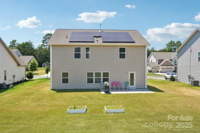 a view of a house with swimming pool