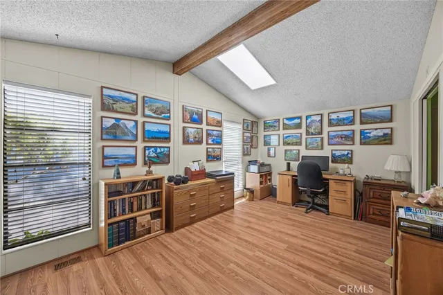 a room with furniture window and book shelf