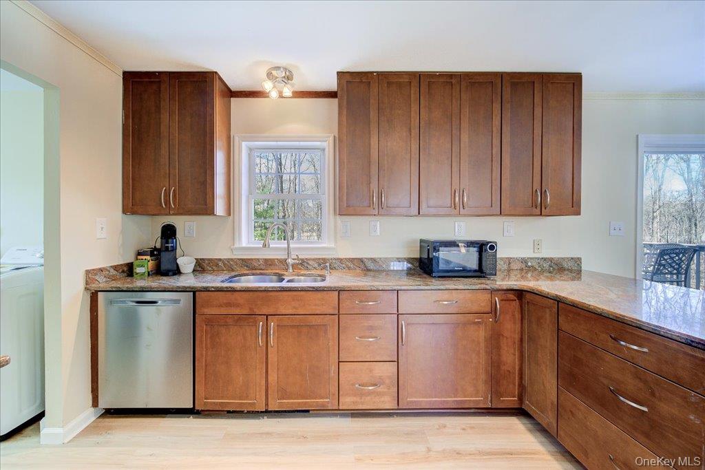 237 South Ohioville Road New Paltz, NY 12561 - Photo 13 of 48 a kitchen with stainless steel appliances granite countertop a sink stove and cabinets