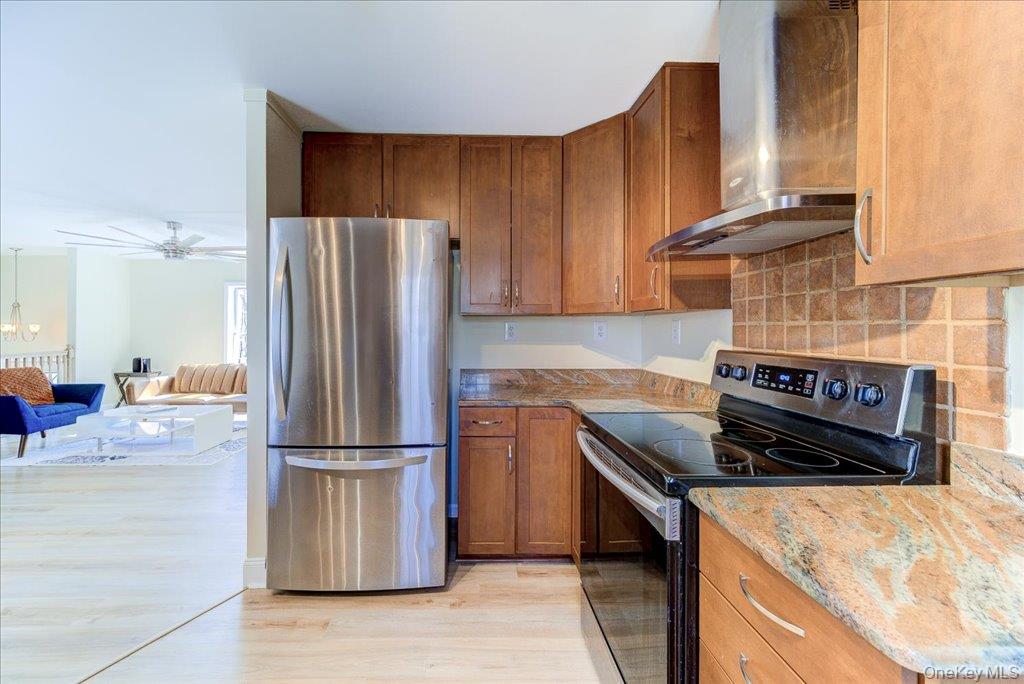 237 South Ohioville Road New Paltz, NY 12561 - Photo 14 of 48 a kitchen with a stove and a refrigerator