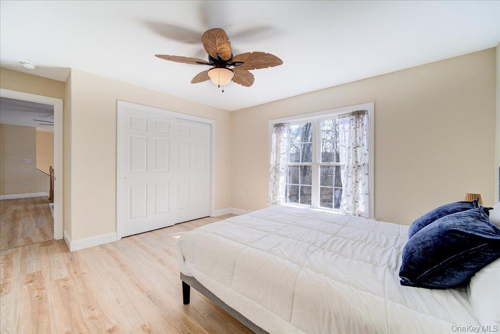 237 South Ohioville Road New Paltz, NY 12561 - Photo 20 of 48 a bedroom with a large bed and a large window