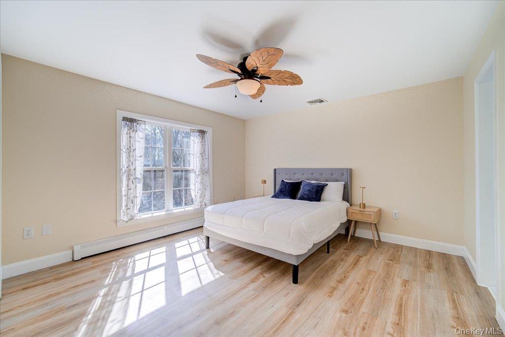 237 South Ohioville Road New Paltz, NY 12561 - Photo 21 of 48 a bedroom with a bed and a window