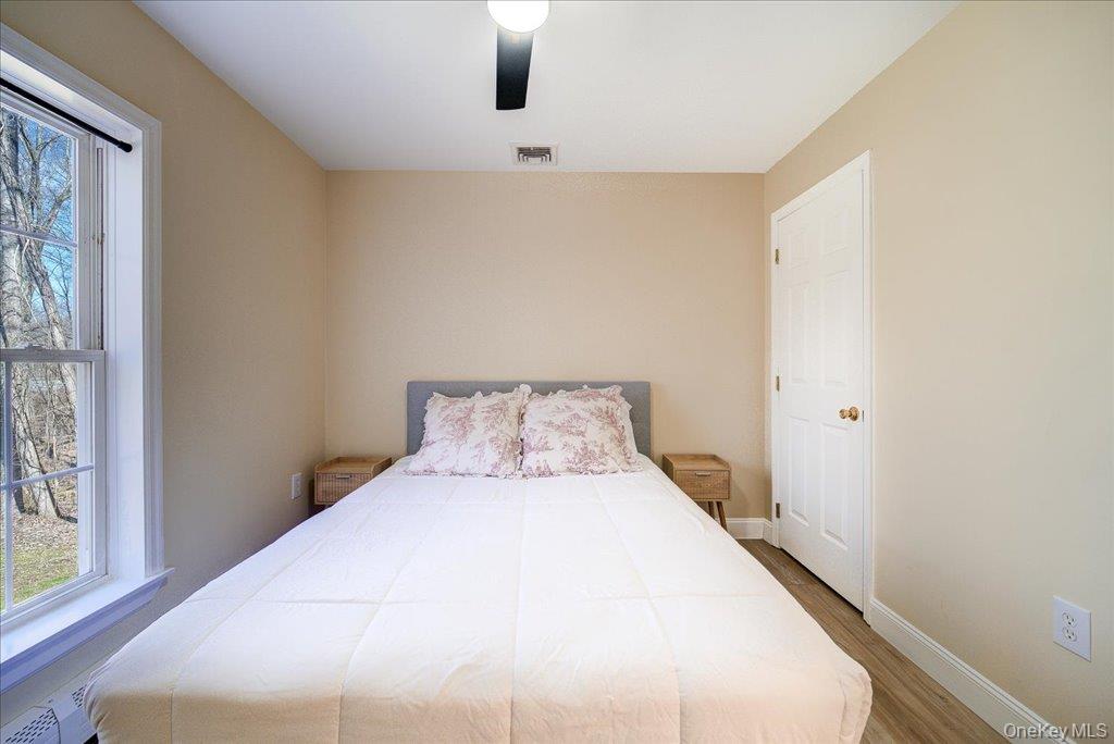 237 South Ohioville Road New Paltz, NY 12561 - Photo 27 of 48 a large bed in a bedroom next to a window