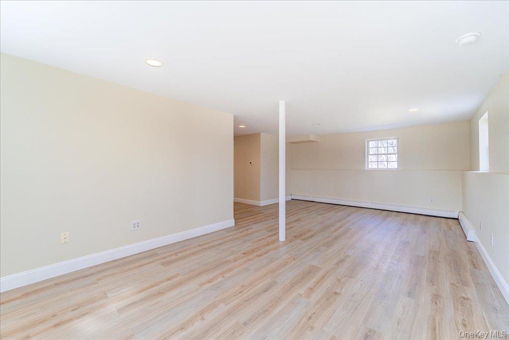 237 South Ohioville Road New Paltz, NY 12561 - Photo 30 of 48 an empty room with wooden floor and entrance