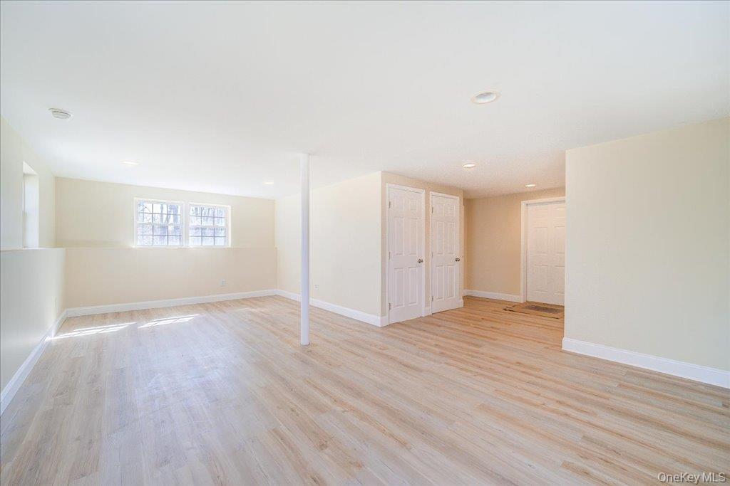 237 South Ohioville Road New Paltz, NY 12561 - Photo 33 of 48 a view of an empty room with wooden floor and a window