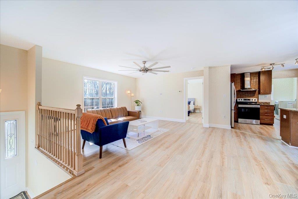 237 South Ohioville Road New Paltz, NY 12561 - Photo 6 of 48 a living room with furniture and a wooden floor