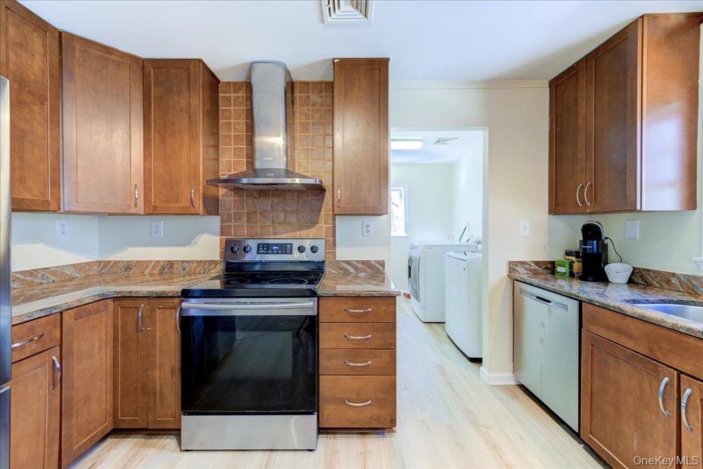 237 South Ohioville Road New Paltz, NY 12561 - Photo 9 of 48 a kitchen with stainless steel appliances granite countertop a stove and a refrigerator