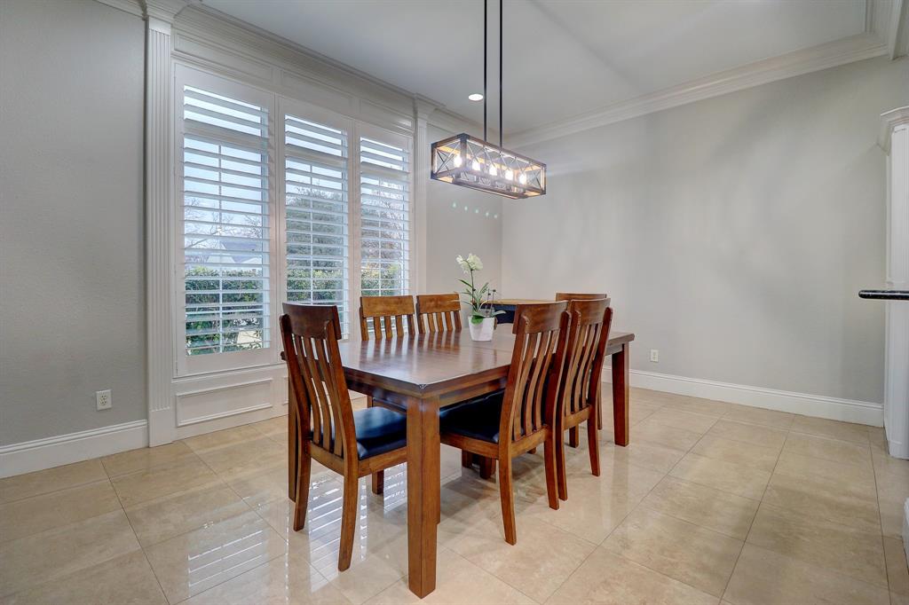 5606 Pershing Avenue Fort Worth, TX 76107 - Photo 3 of 12 a view of a dining room with furniture window and outside view