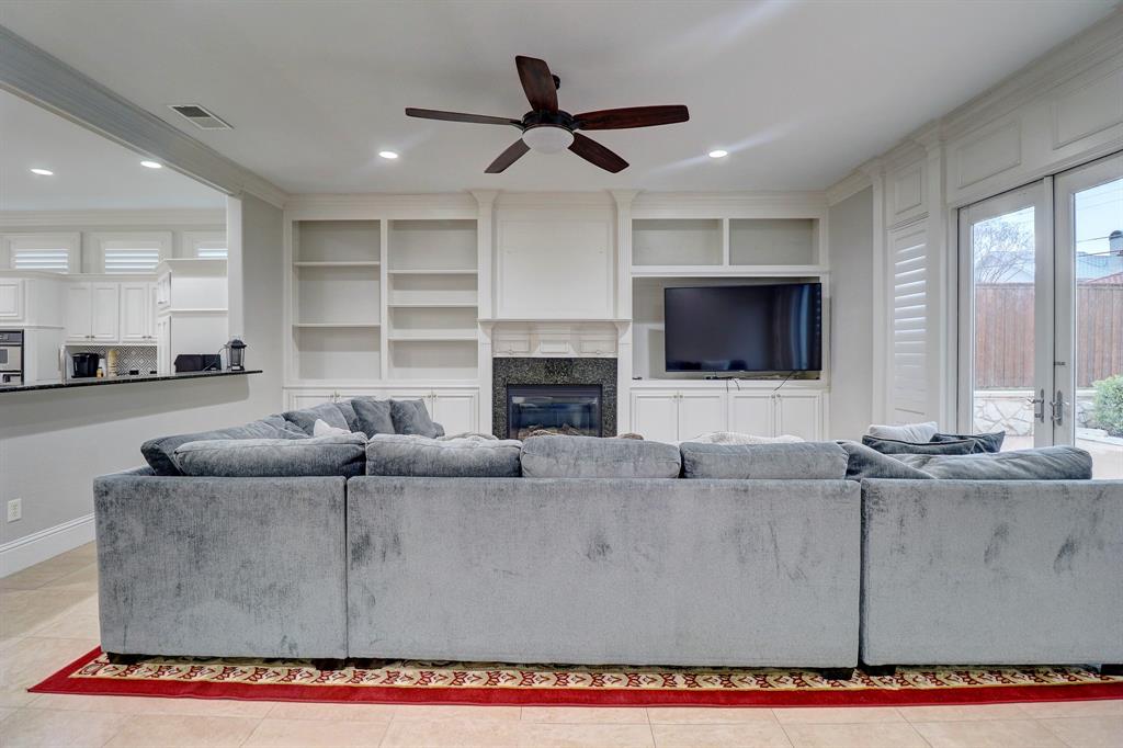 5606 Pershing Avenue Fort Worth, TX 76107 - Photo 5 of 12 a living room with furniture and a flat screen tv