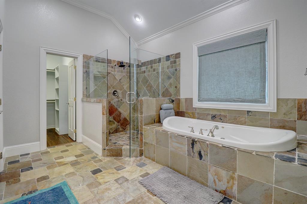 5606 Pershing Avenue Fort Worth, TX 76107 - Photo 7 of 12 a bathroom with a sink mirror and a bath tub