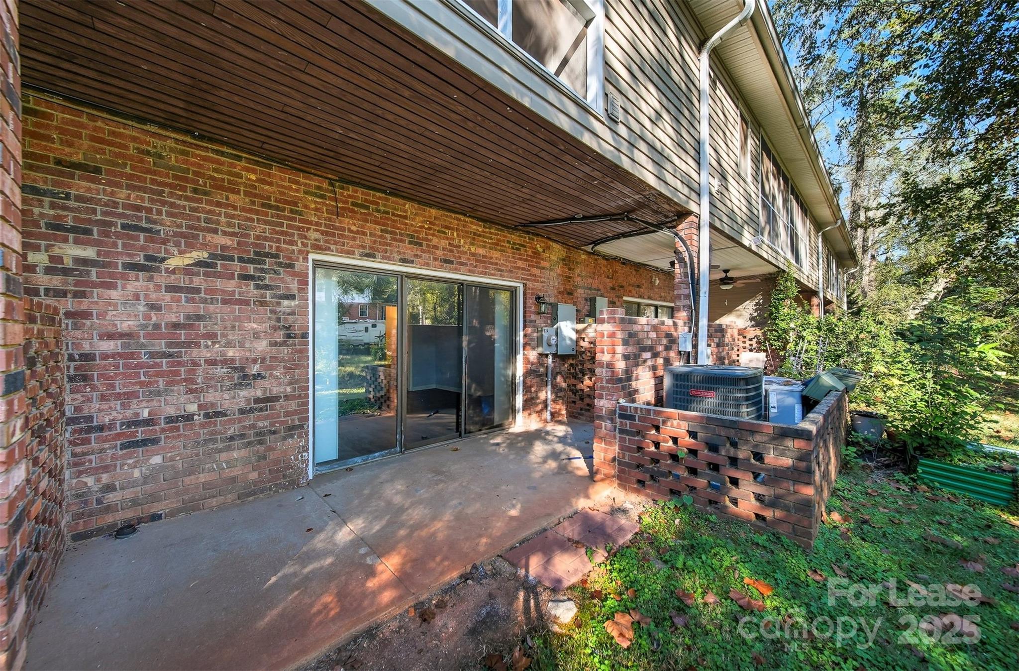 824 6th Street Northwest Hickory, NC 28601 - Photo 35 of 38 a view of a patio with table and chairs under an umbrella