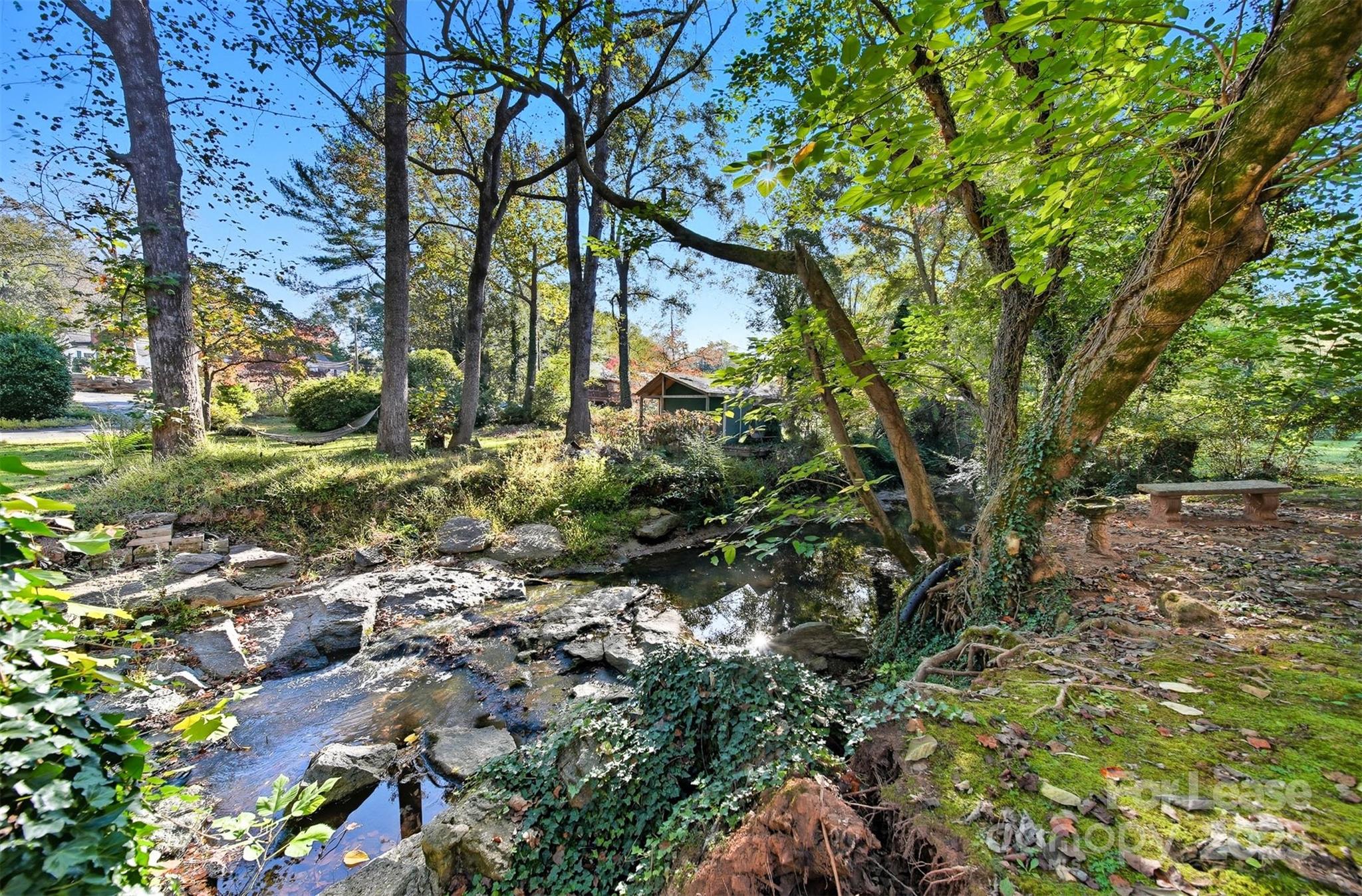 824 6th Street Northwest Hickory, NC 28601 - Photo 37 of 38 a backyard of a house with a yard and outdoor seating