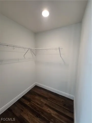 a view of an empty walk in closet